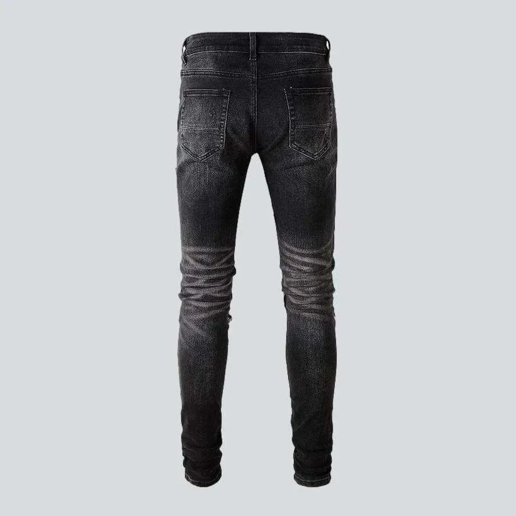 Vintage black ripped biker jeans