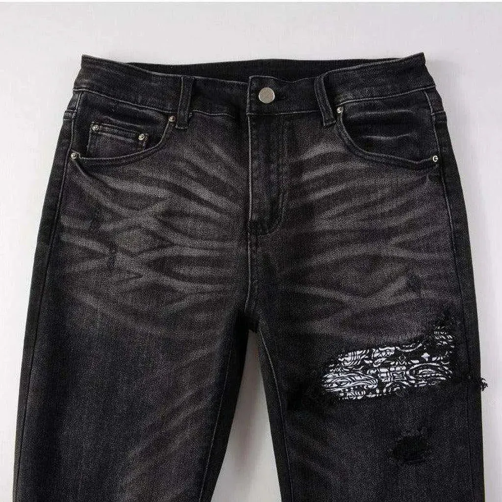 Vintage black ripped biker jeans