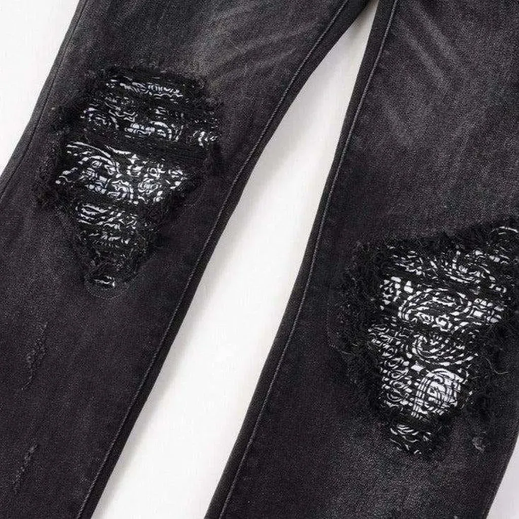 Vintage black ripped biker jeans